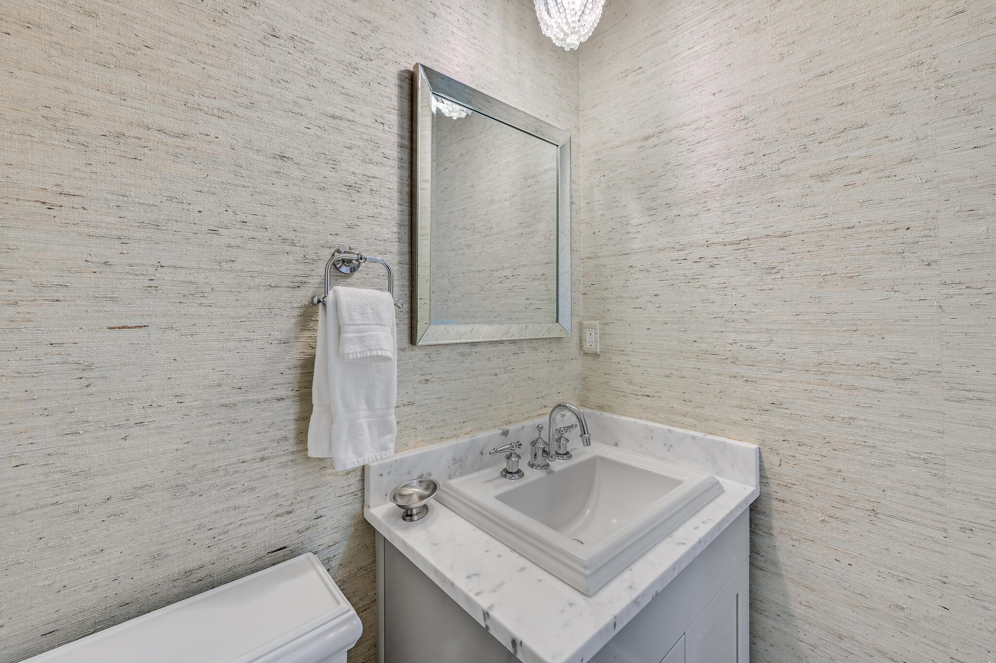 37 Compass Point Way South, Unit 108 Inlet Beach, FL 32461 - Photo 16 of 65 a bathroom with a sink a toilet and mirror