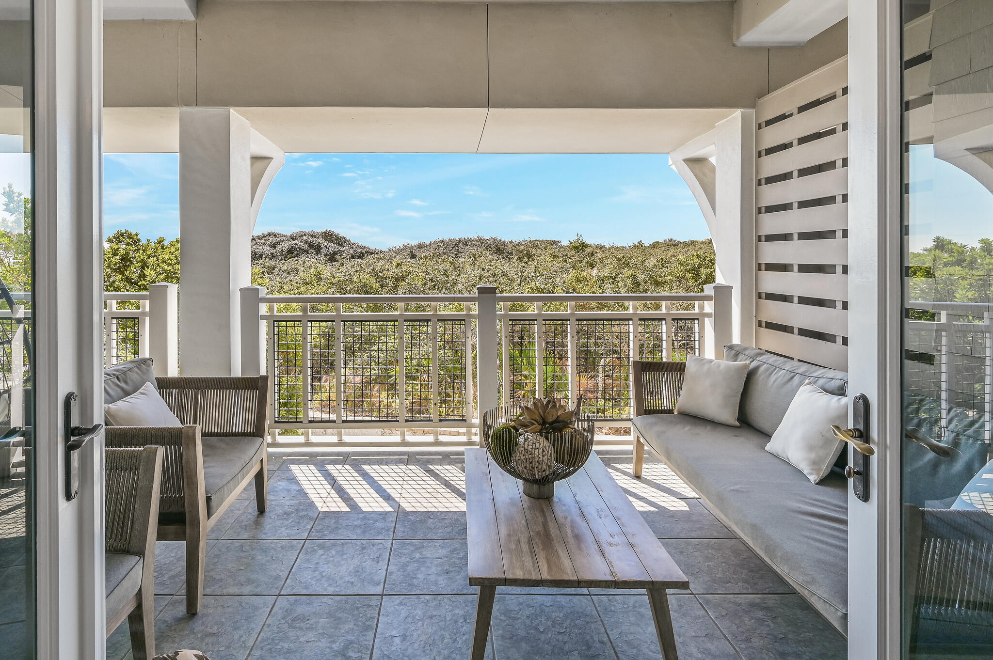 37 Compass Point Way South, Unit 108 Inlet Beach, FL 32461 - Photo 2 of 65 a living room with furniture and a large window