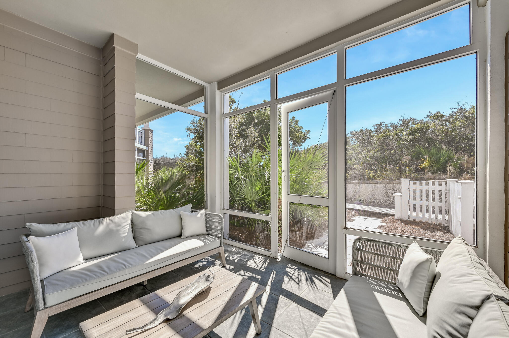 37 Compass Point Way South, Unit 108 Inlet Beach, FL 32461 - Photo 24 of 65 a living room with furniture and a large window