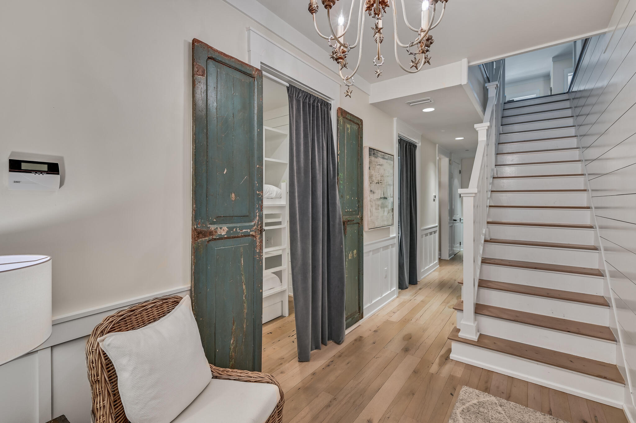 37 Compass Point Way South, Unit 108 Inlet Beach, FL 32461 - Photo 26 of 65 a view of a hallway with entryway and chandelier