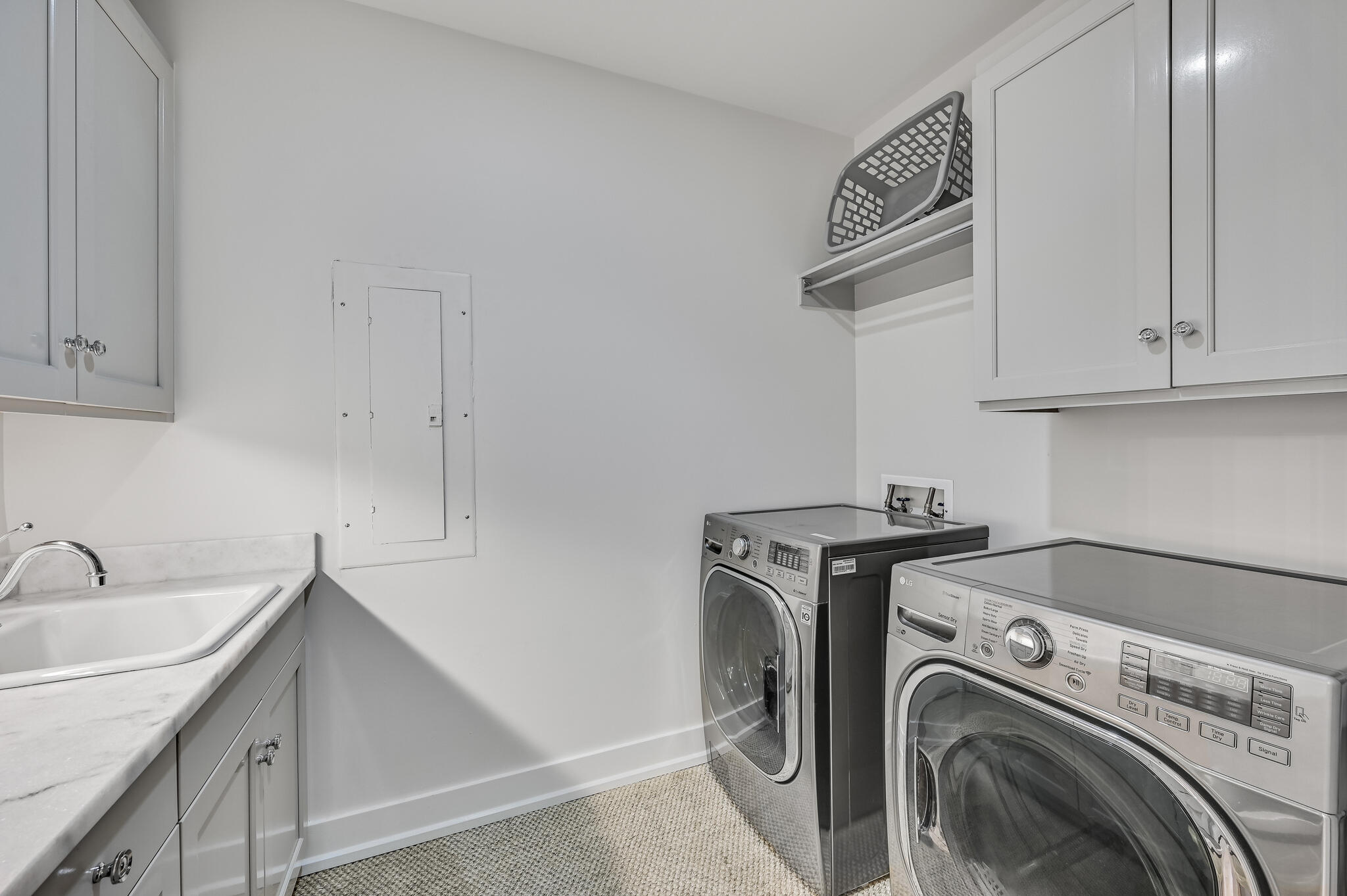 37 Compass Point Way South, Unit 108 Inlet Beach, FL 32461 - Photo 28 of 65 a utility room with sink dryer and washer