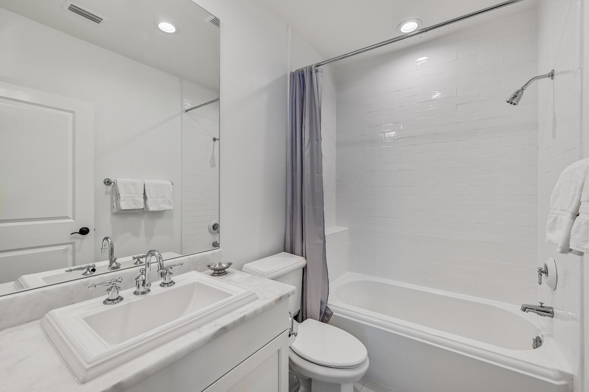 37 Compass Point Way South, Unit 108 Inlet Beach, FL 32461 - Photo 34 of 65 a bathroom with a bathtub shower sink vanity mirror and toilet