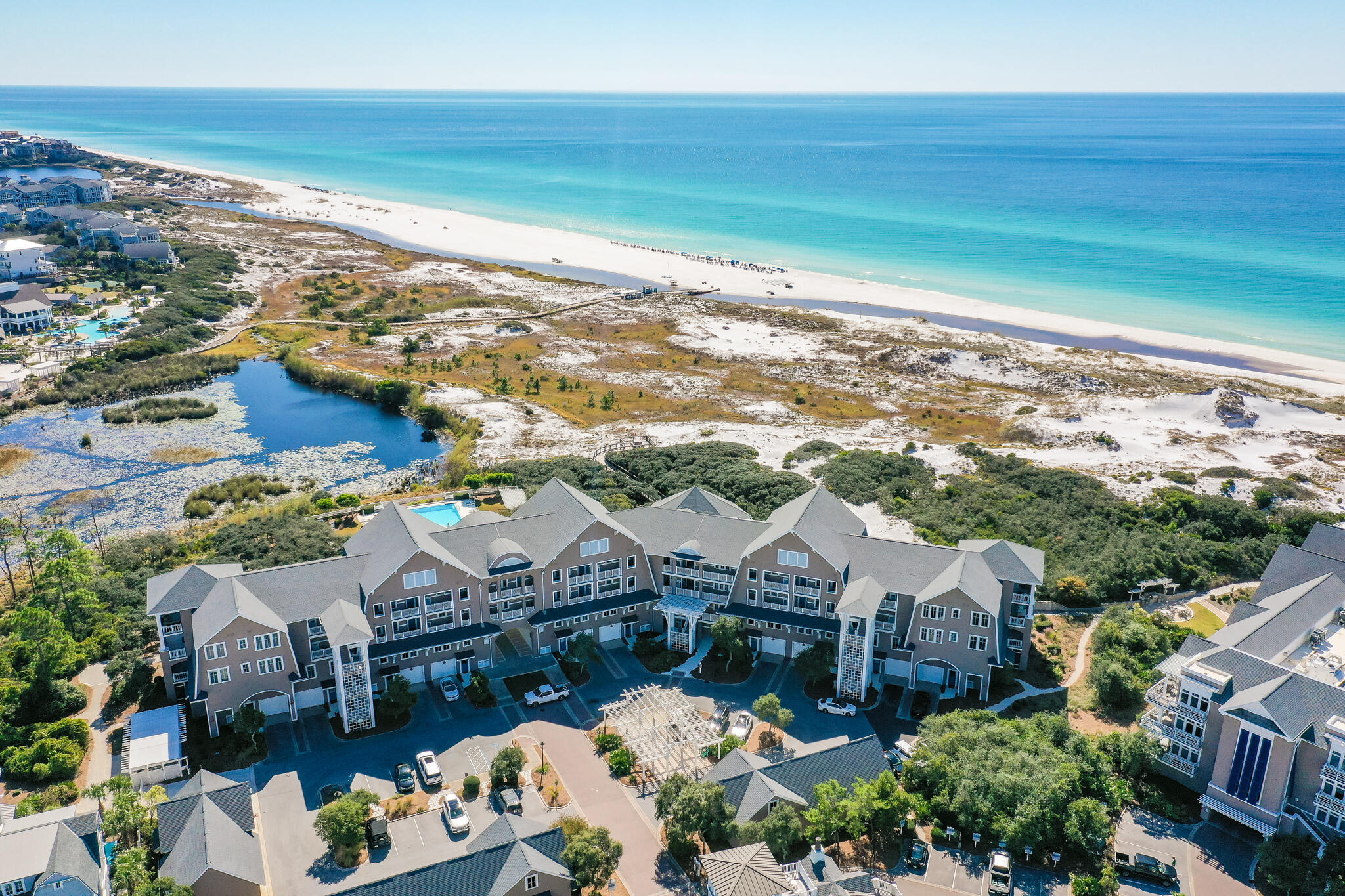 37 Compass Point Way South, Unit 108 Inlet Beach, FL 32461 - Photo 64 of 65 a view of a city with an ocean