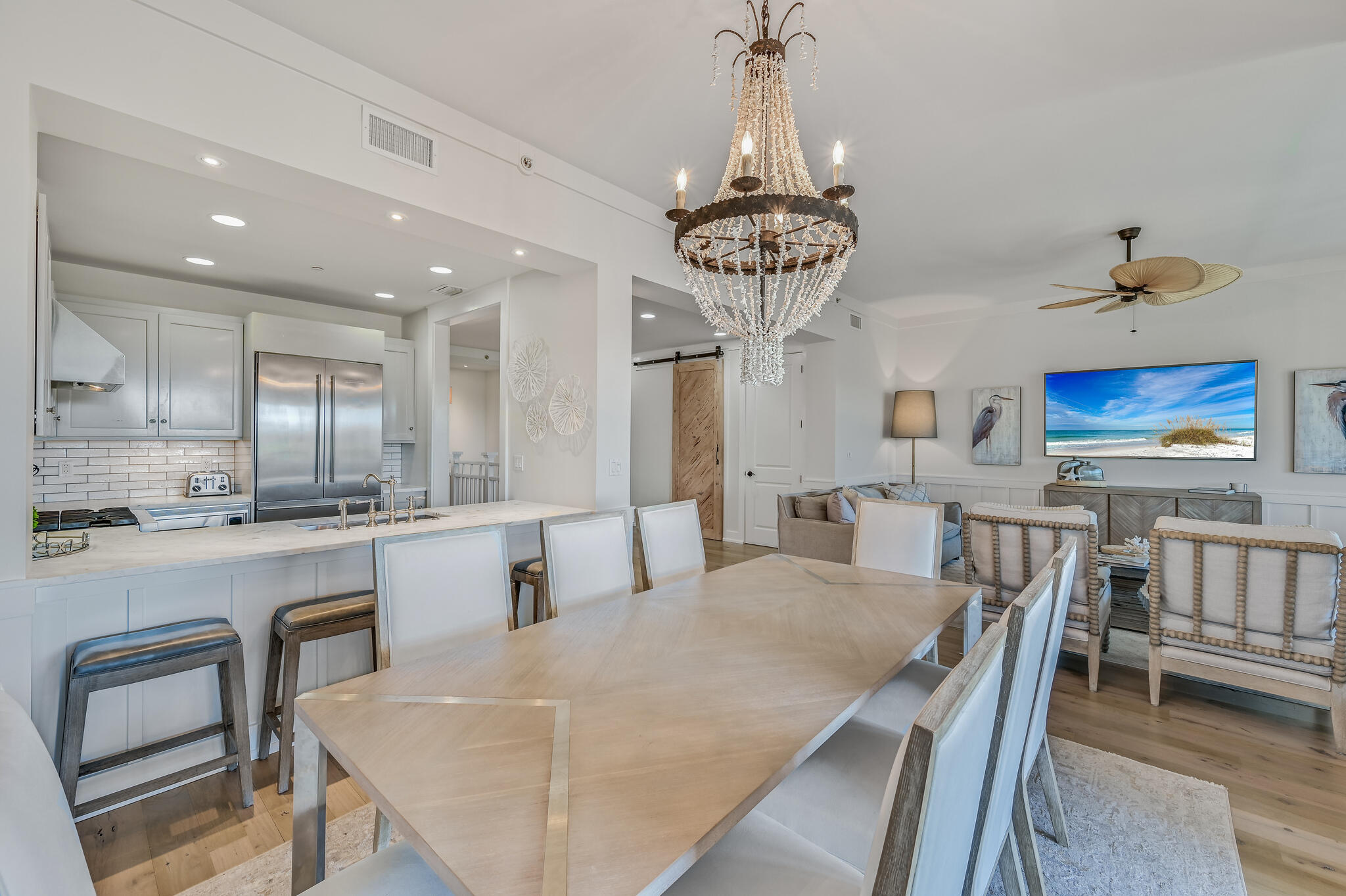 37 Compass Point Way South, Unit 108 Inlet Beach, FL 32461 - Photo 9 of 65 a large kitchen with a table and chairs