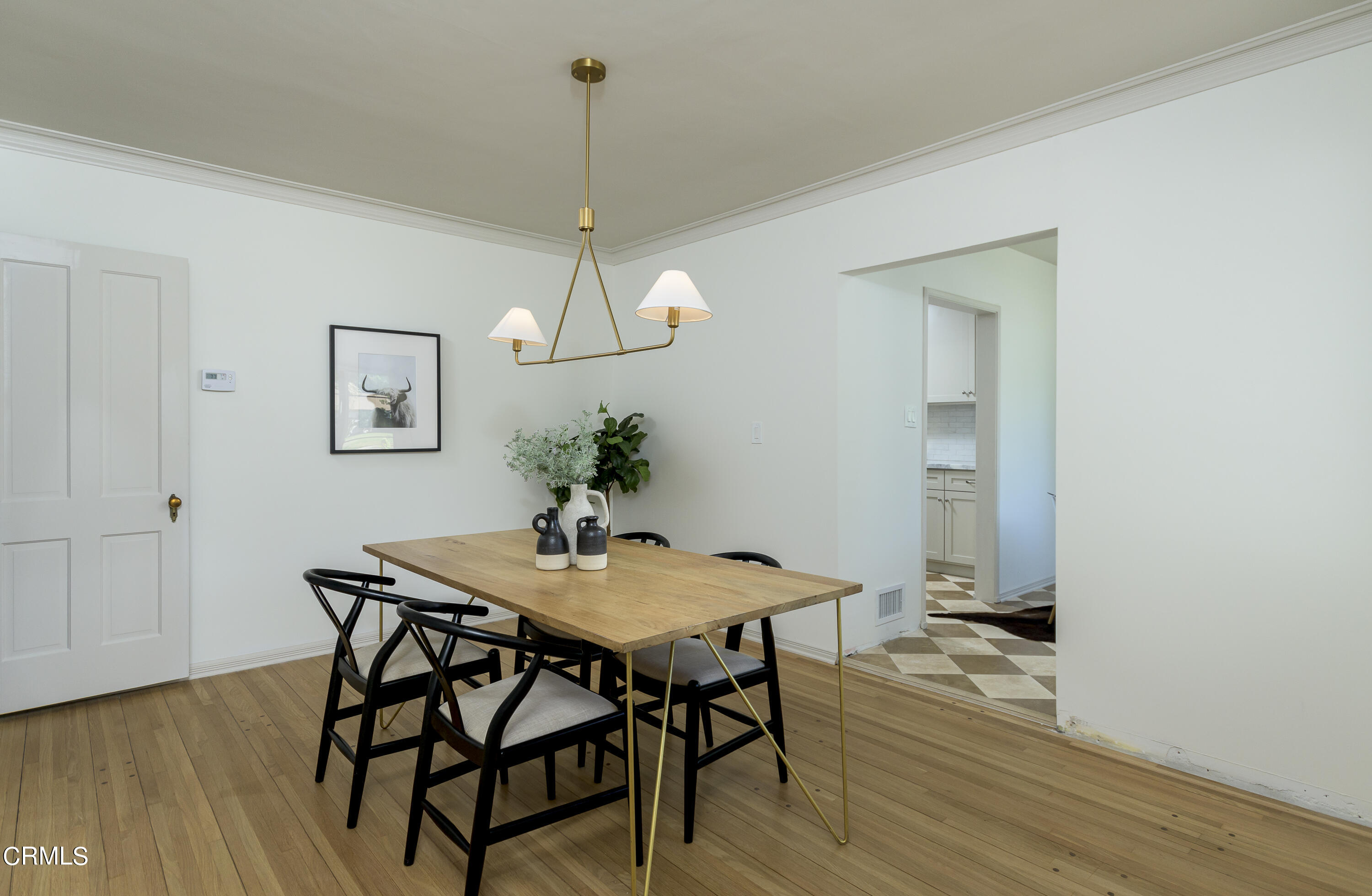 960 Roxbury Drive Pasadena, CA 91104 - Photo 6 of 28 a view of a dining room with furniture and wooden floor