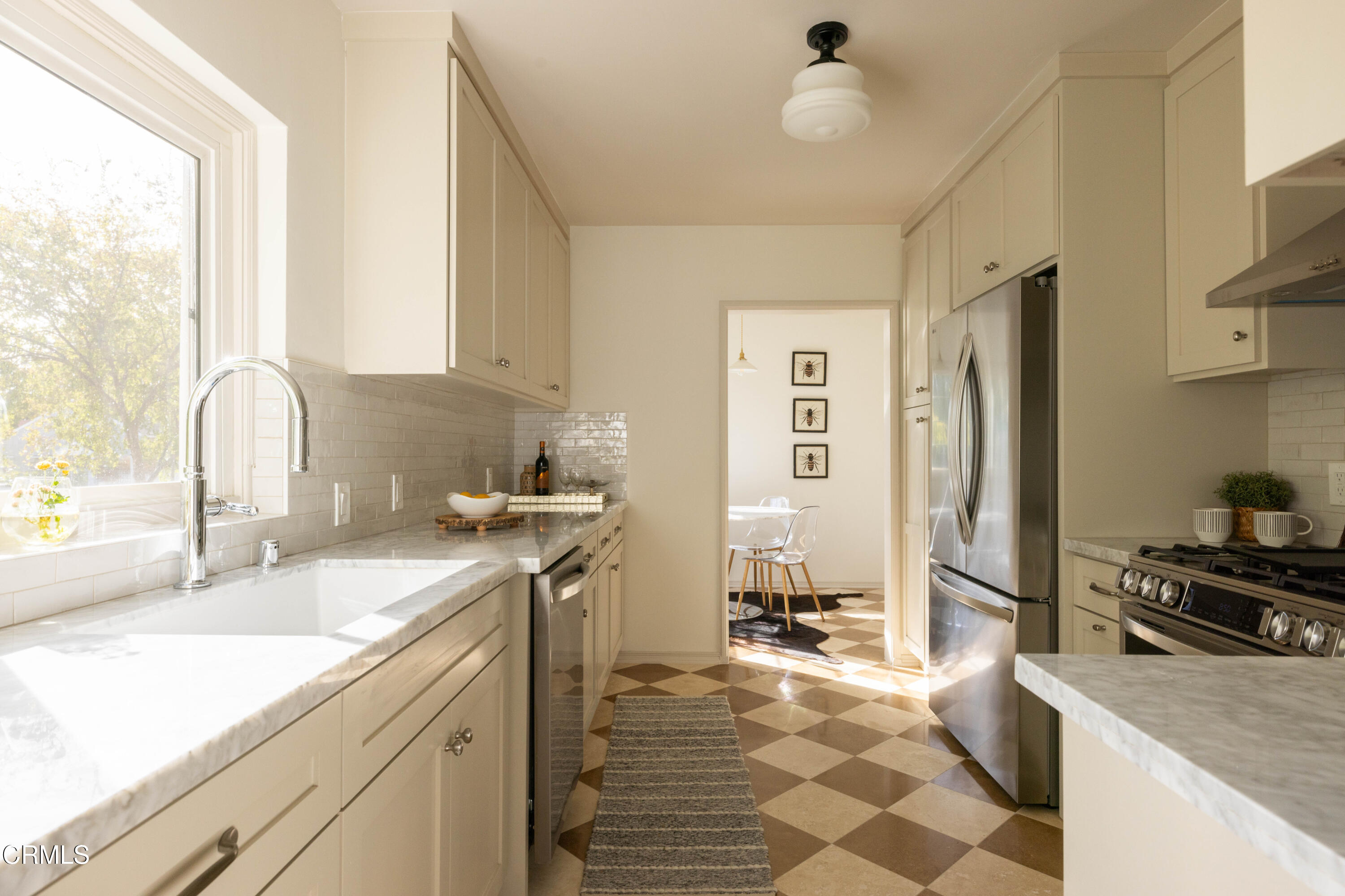 960 Roxbury Drive Pasadena, CA 91104 - Photo 9 of 28 a kitchen with a sink stove and refrigerator
