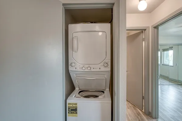 a view of balcony with a couple of trees