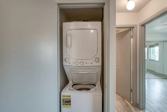 a view of balcony with a couple of trees