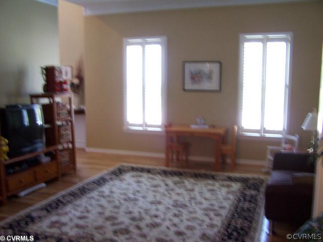 1001 Goswick Ridge Road Midlothian, VA 23114 - Photo 3 of 10 a room with furniture and a window