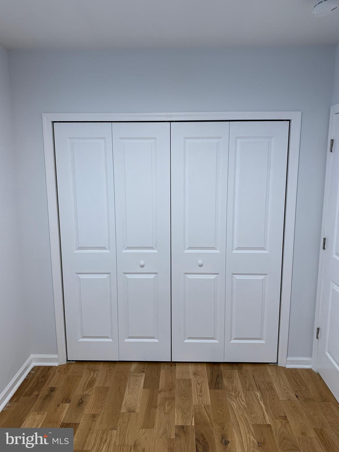 431 South 56th Street, Unit 1 Philadelphia, PA 19143 - Photo 16 of 29 a view of room with hardwood floor