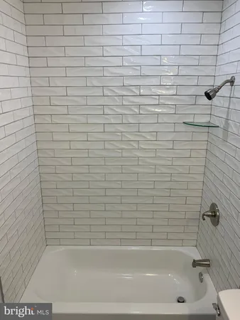 a bathroom with a bathtub