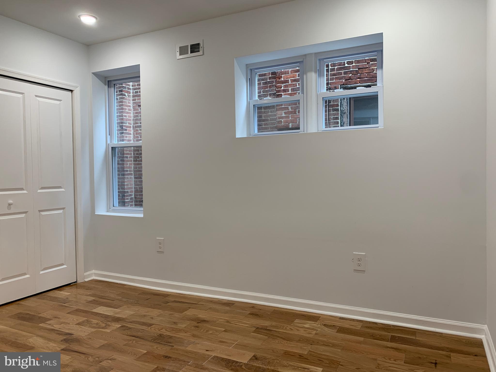 431 South 56th Street, Unit 1 Philadelphia, PA 19143 - Photo 23 of 29 a view of an empty room with window