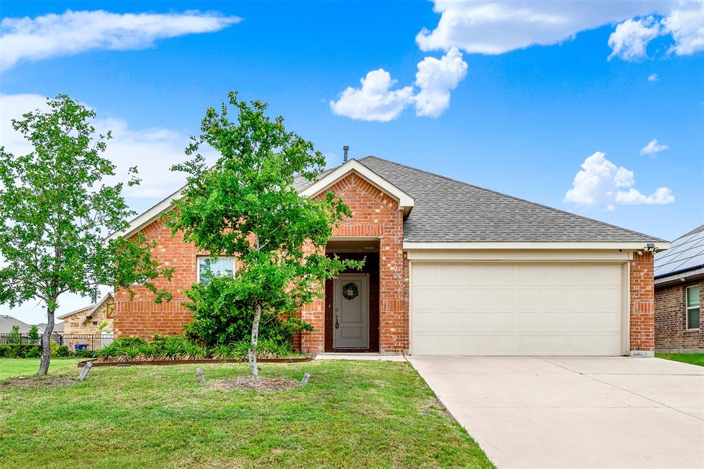 720 Willow View Way Princeton, TX 75407 - Photo 1 of 33 a front view of a house with a yard and a garage