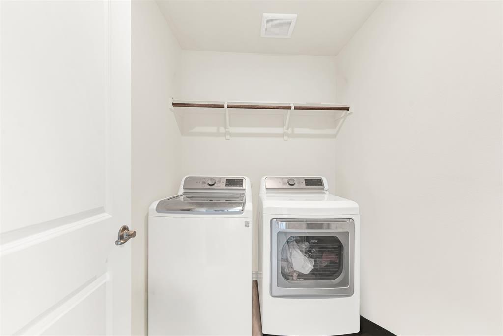 720 Willow View Way Princeton, TX 75407 - Photo 23 of 33 a utility room with dryer and washer