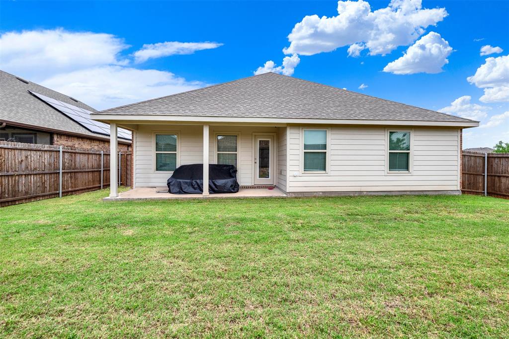 720 Willow View Way Princeton, TX 75407 - Photo 26 of 33 a view of a house with a backyard