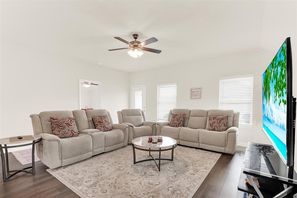 720 Willow View Way Princeton, TX 75407 - Photo 10 of 33 a living room with furniture and a large window
