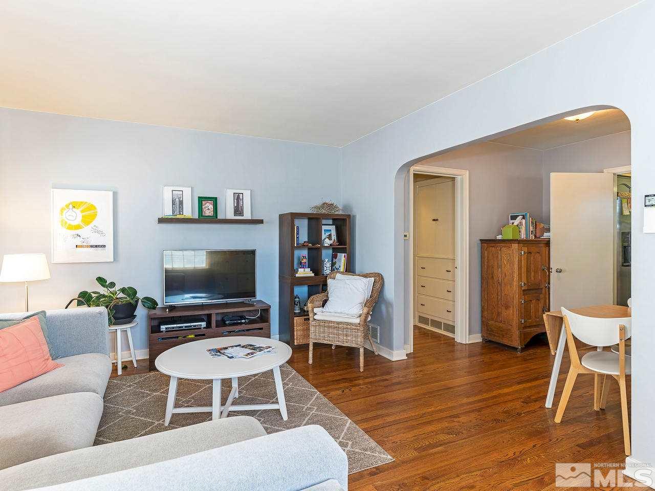 1441 Forest Street Reno, NV 89509 - Photo 5 of 15 a living room with furniture a piano and a flat screen tv