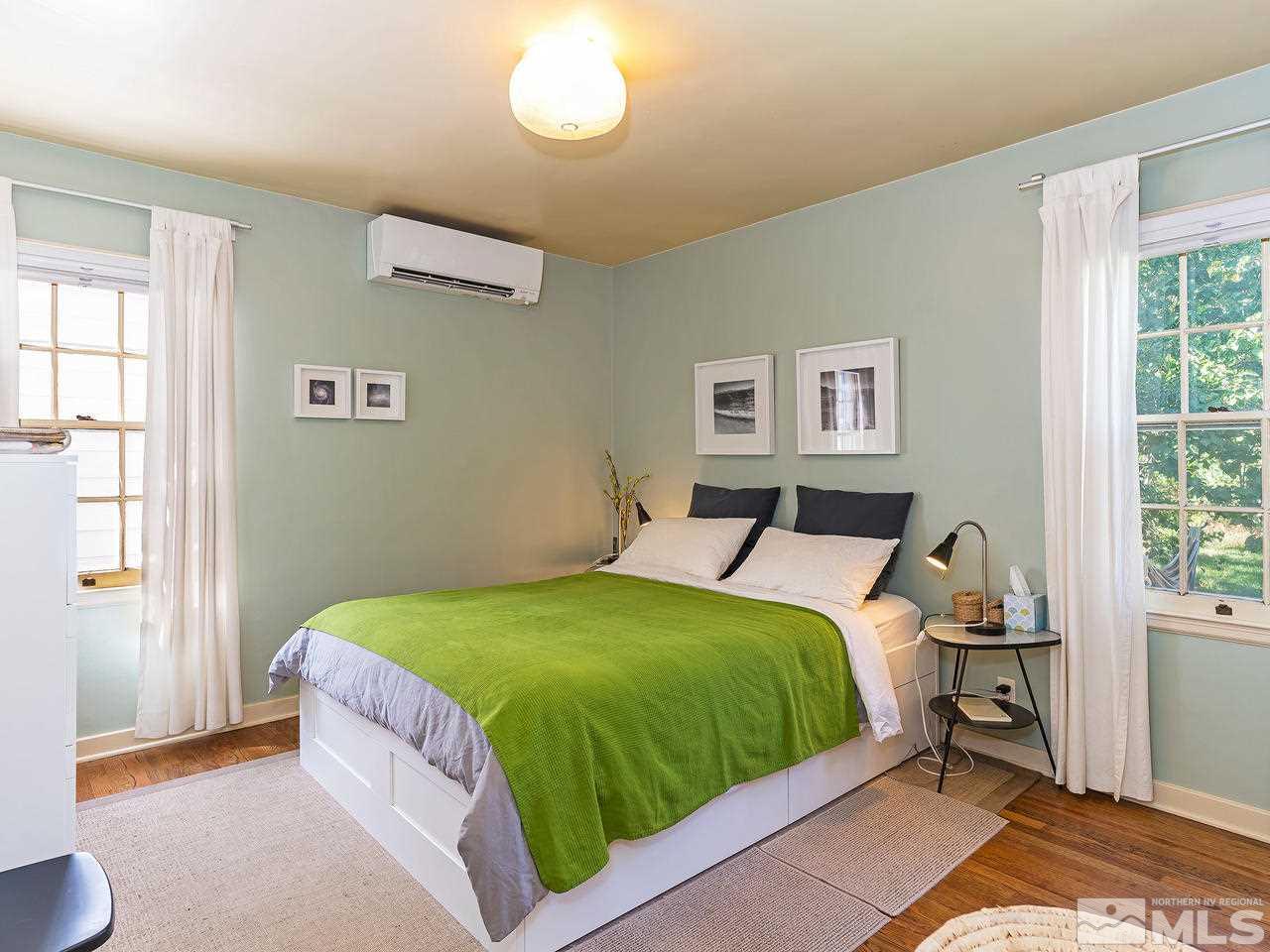1441 Forest Street Reno, NV 89509 - Photo 8 of 15 a bedroom with a bed and a window