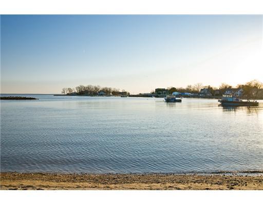 112 Pear Tree Point Road Darien, CT 06820 - Photo 4 of 20 a view of a lake with houses in the back