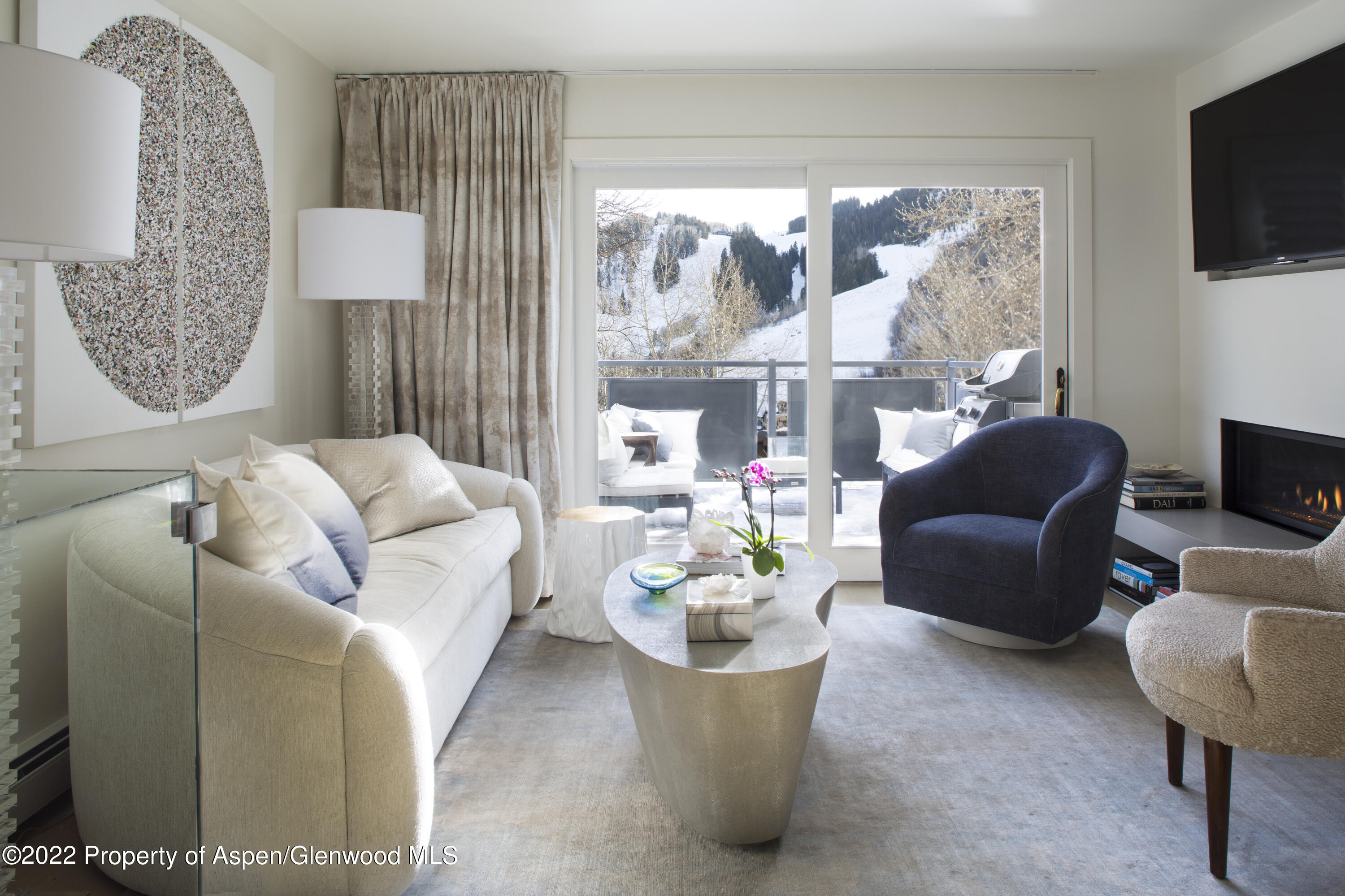 124 East Durant Avenue, Unit 2 Aspen, CO 81611 - Photo 1 of 15 Living Room with Aspen Mountain View