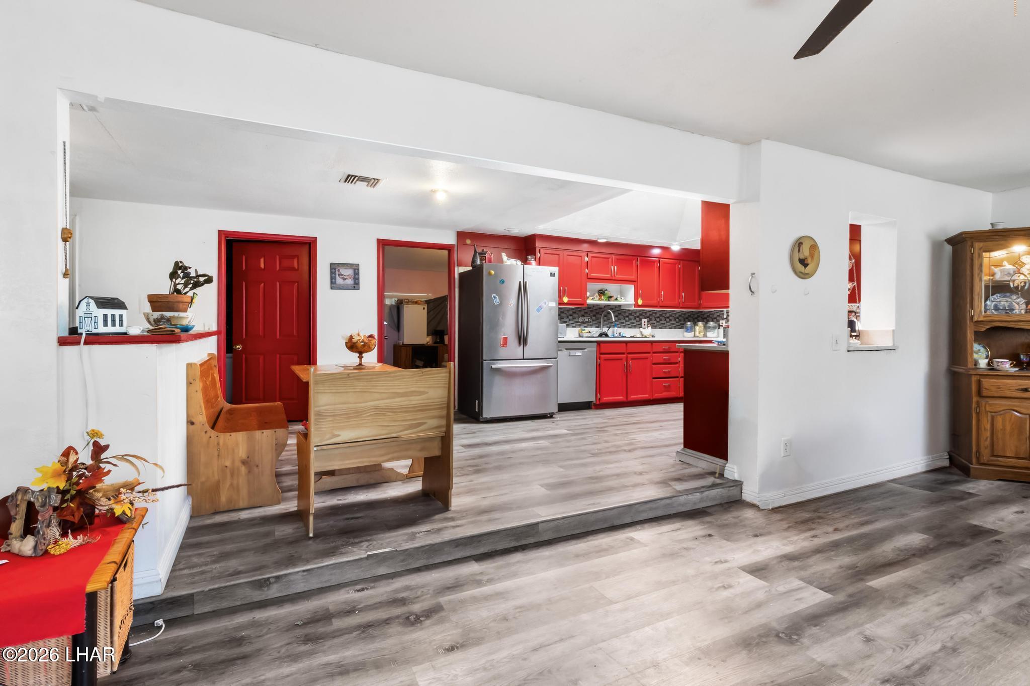 827 Ramar Road Bullhead City, AZ 86442 - Photo 5 of 34 livingroom to kitchen