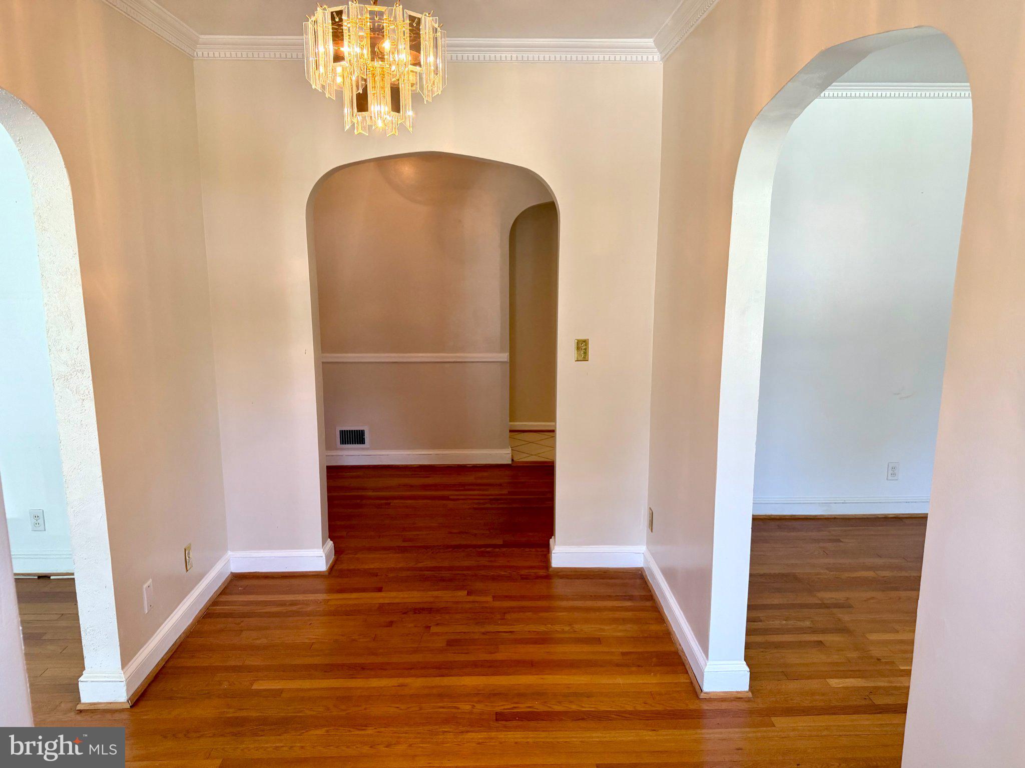 6318 Winner Avenue Baltimore, MD 21215 - Photo 8 of 75 Elegant arches in a warm entryway.