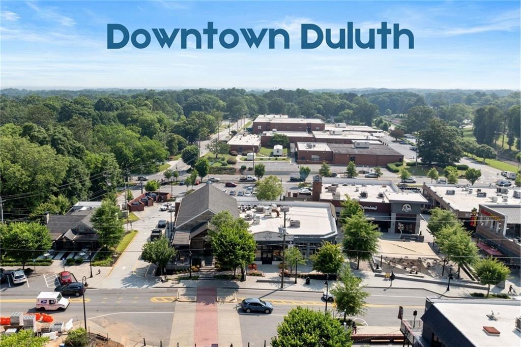 3334 Swallowtail Terrace Duluth, GA 30096 - Photo 10 of 37 an aerial view of a city