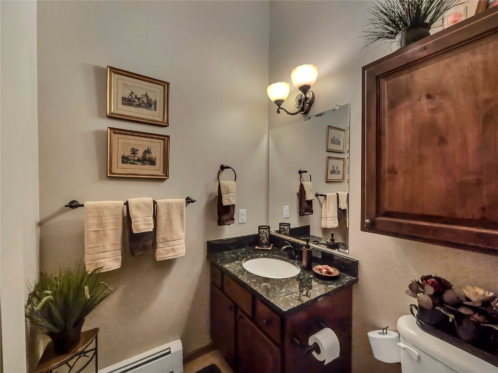 3710 Ryan Gulch Road, Unit 3710 Silverthorne, CO 80498 - Photo 25 of 50 a bathroom with a sink and a mirror