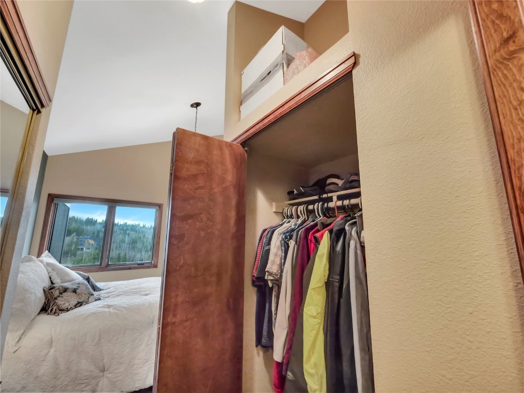 3710 Ryan Gulch Road, Unit 3710 Silverthorne, CO 80498 - Photo 33 of 50 a view of walk in closet with clothes and shoes