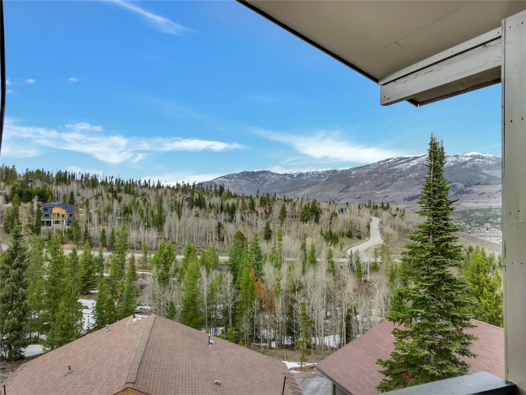 3710 Ryan Gulch Road, Unit 3710 Silverthorne, CO 80498 - Photo 41 of 50 a view of a city from a balcony