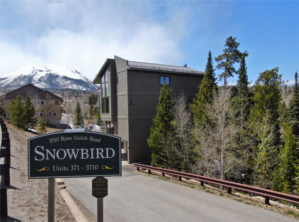 3710 Ryan Gulch Road, Unit 3710 Silverthorne, CO 80498 - Photo 49 of 50 a street sign on a pole on a street