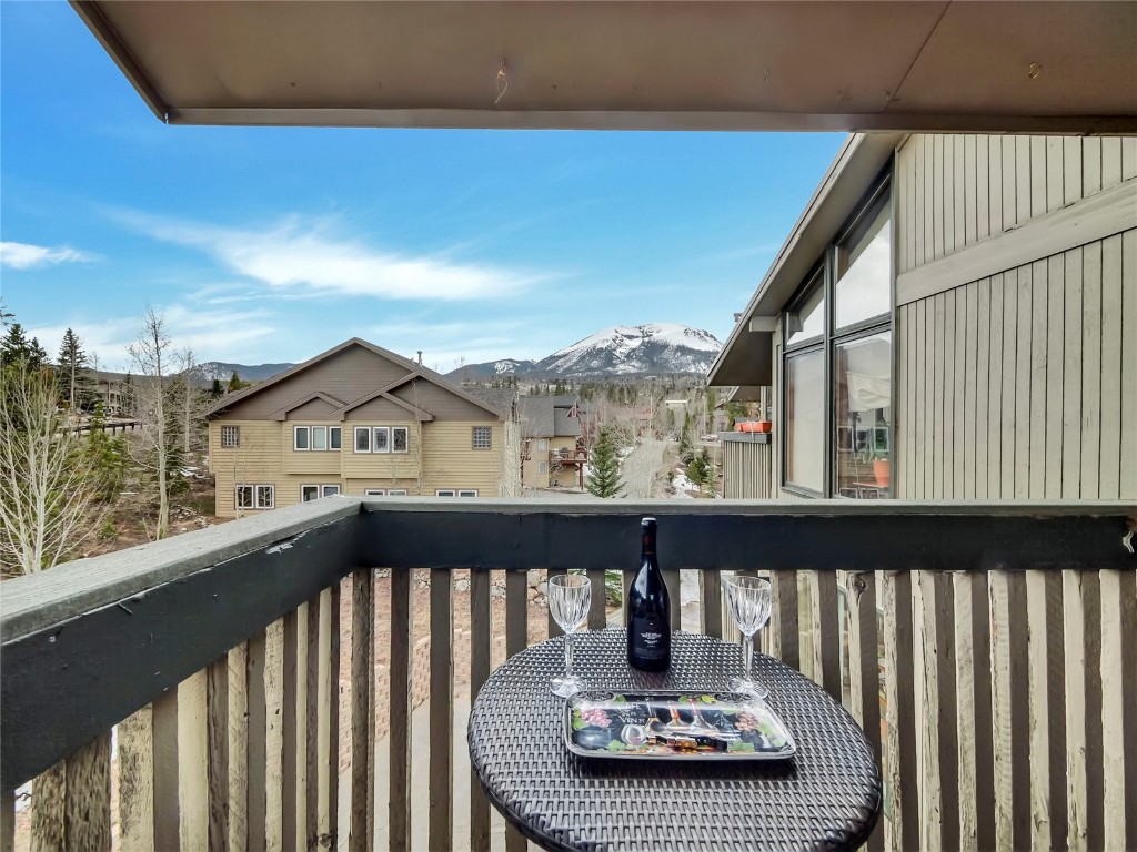 3710 Ryan Gulch Road, Unit 3710 Silverthorne, CO 80498 - Photo 5 of 50 a view of balcony with furniture and wooden floor