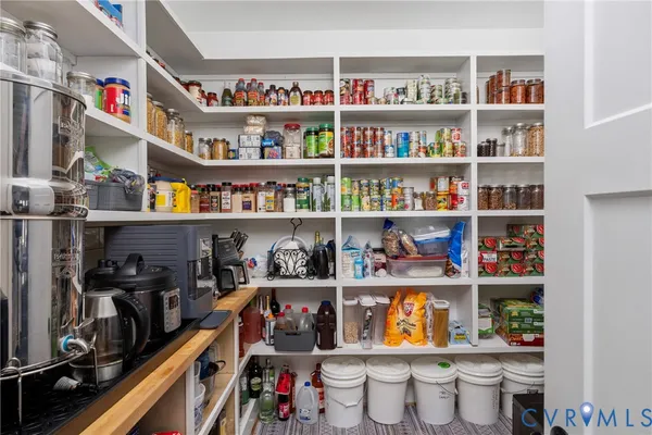 a bathroom with a sink a mirror and vanity