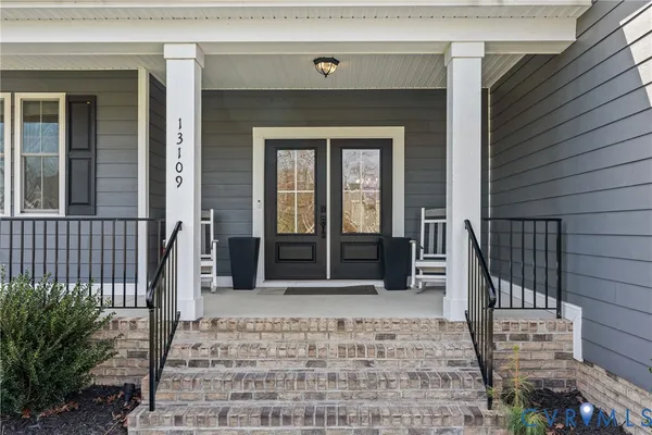 a front view of a house with a porch