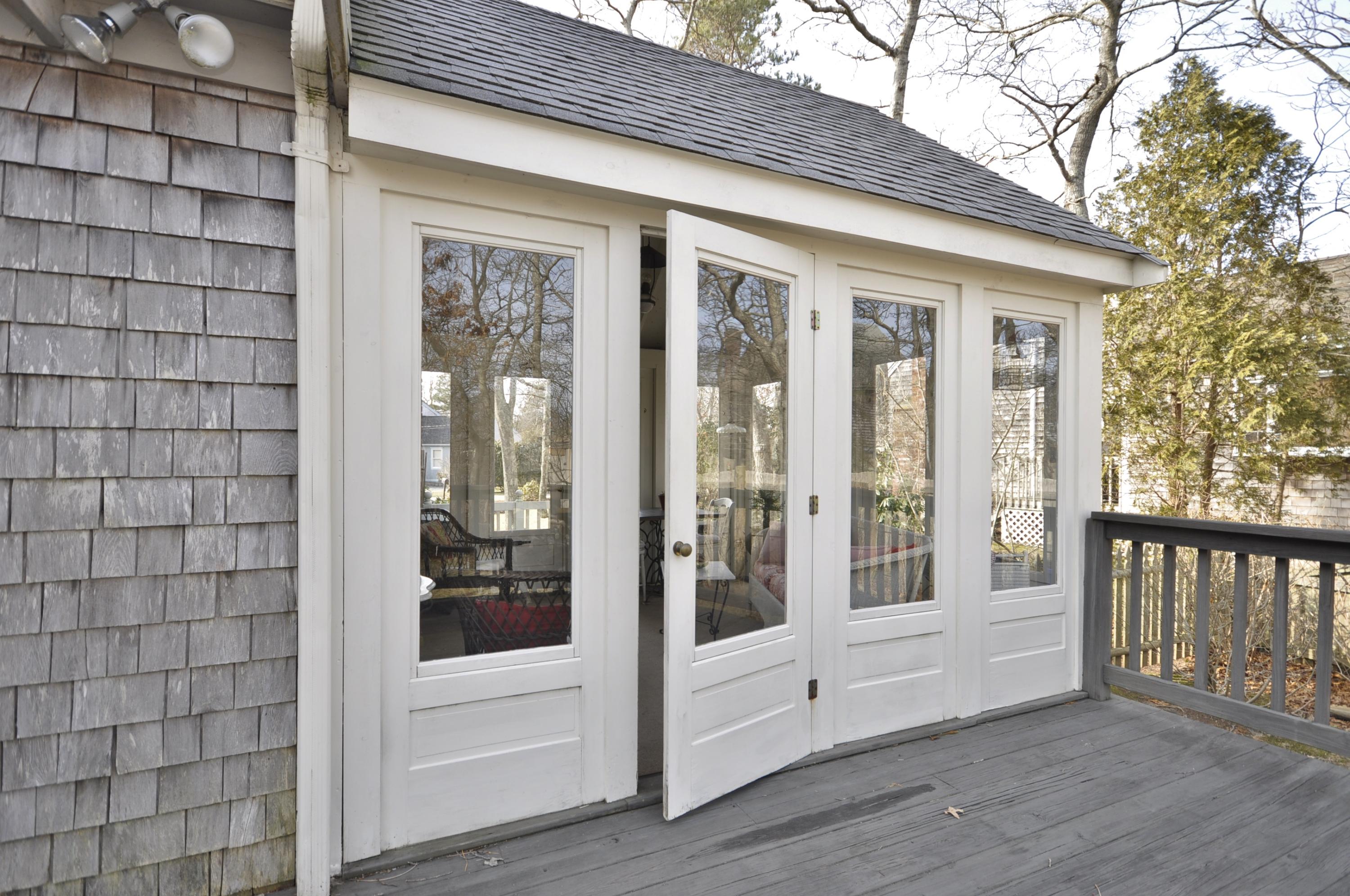 34 Norris Road Sagamore Beach, MA 02562 - Photo 8 of 30 Back of Sun room