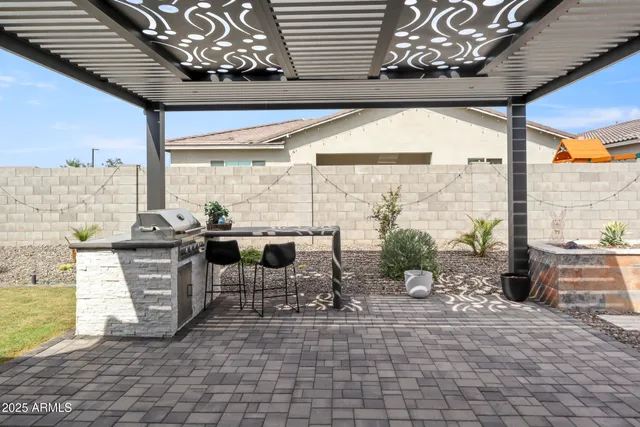 a very nice looking dining room with a large window