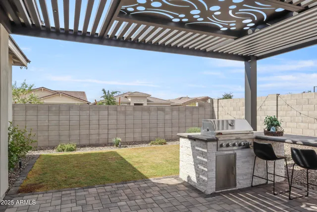 a view of a swimming pool with a patio