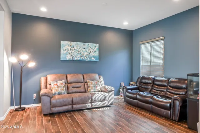 a living room with furniture and a couch