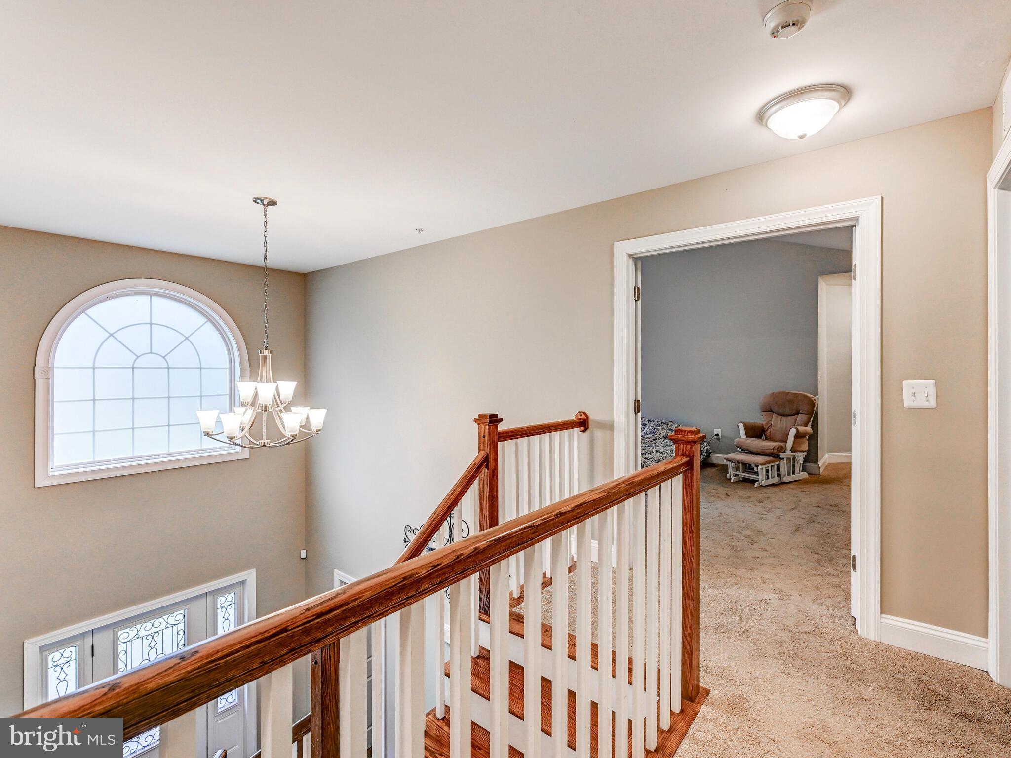 11707 Manor Road Glen Arm, MD 21057 - Photo 23 of 43 a view of a livingroom with furniture and stairs