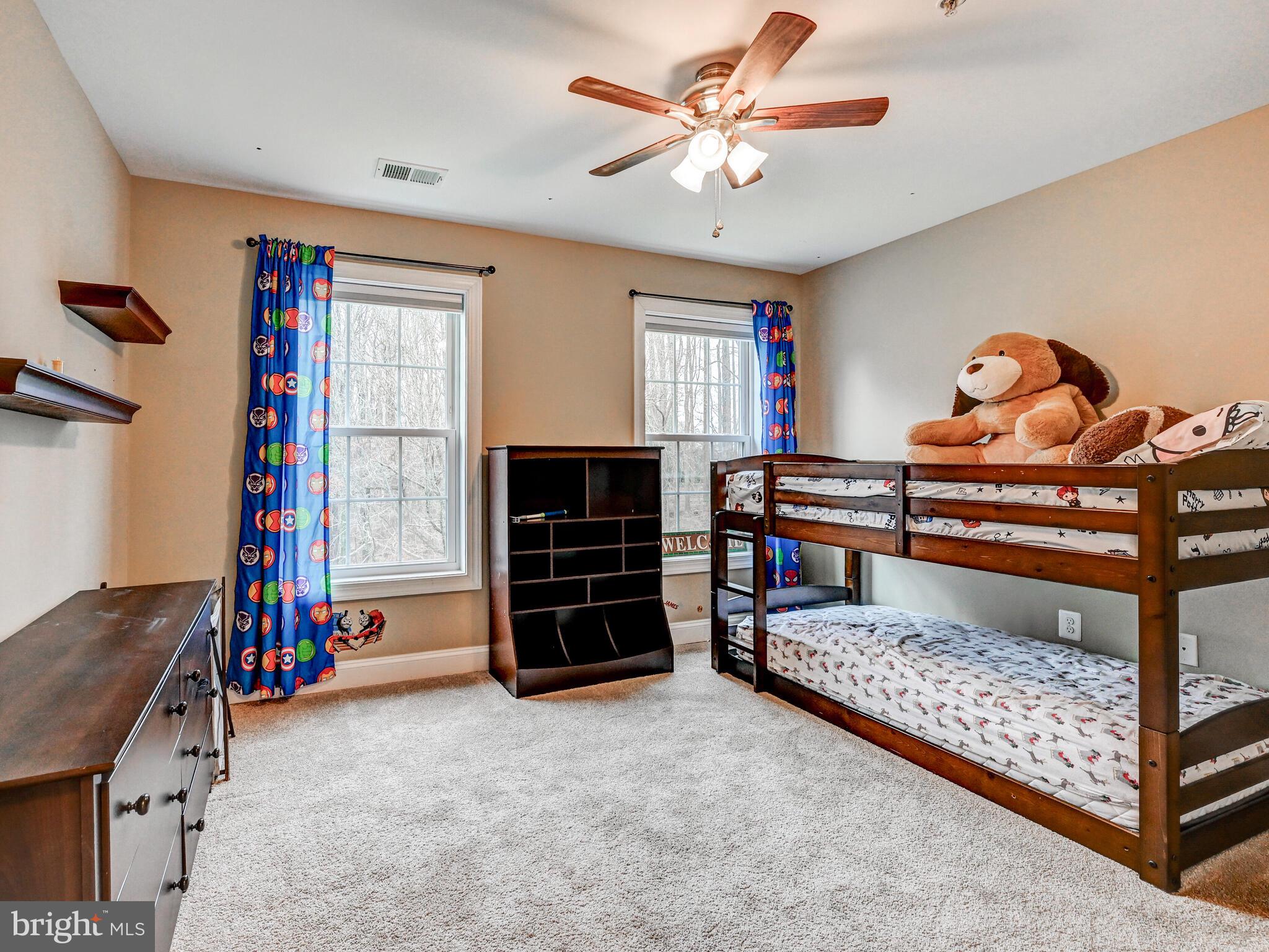 11707 Manor Road Glen Arm, MD 21057 - Photo 27 of 43 a living room with furniture and a flat screen tv