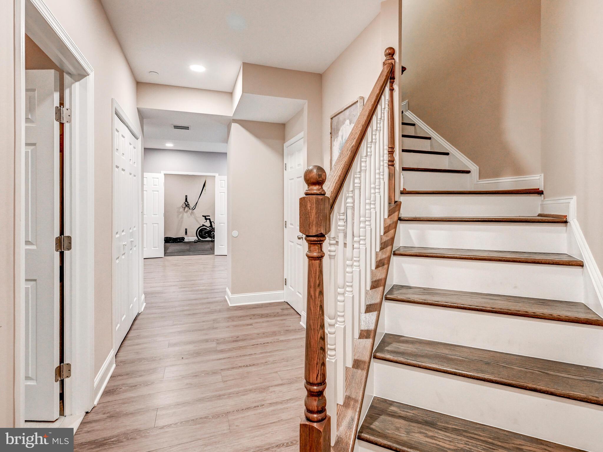 11707 Manor Road Glen Arm, MD 21057 - Photo 32 of 43 a view of a hallway with wooden floor and entryway