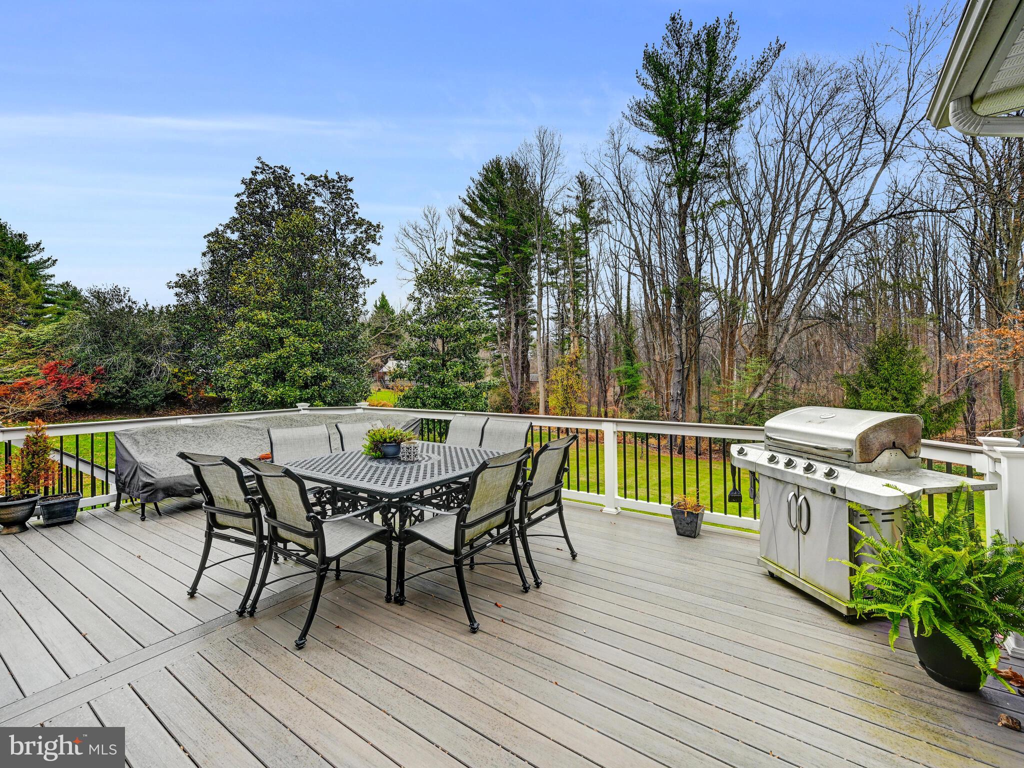 11707 Manor Road Glen Arm, MD 21057 - Photo 41 of 43 a view of a chairs and table on the deck