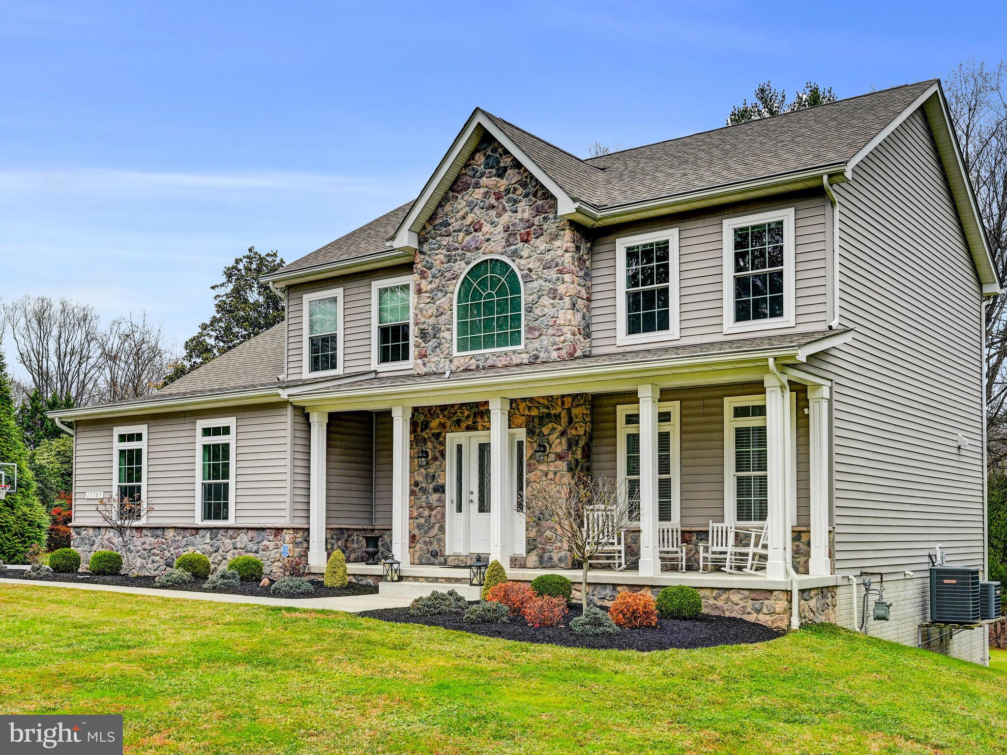 11707 Manor Road Glen Arm, MD 21057 - Photo 5 of 43 a front view of a house with a yard