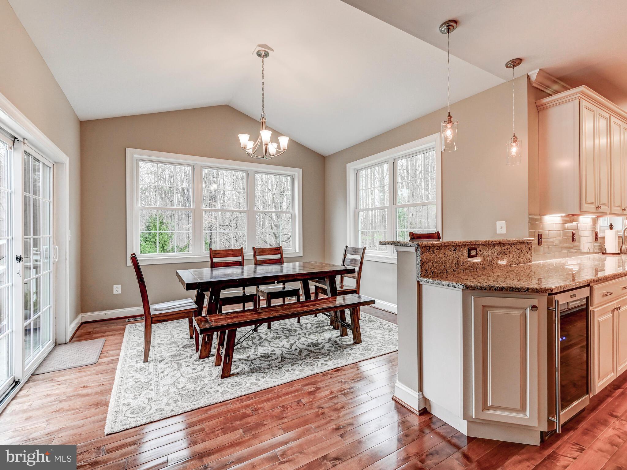 11707 Manor Road Glen Arm, MD 21057 - Photo 10 of 43 a view of a dining room with furniture window and wooden floor