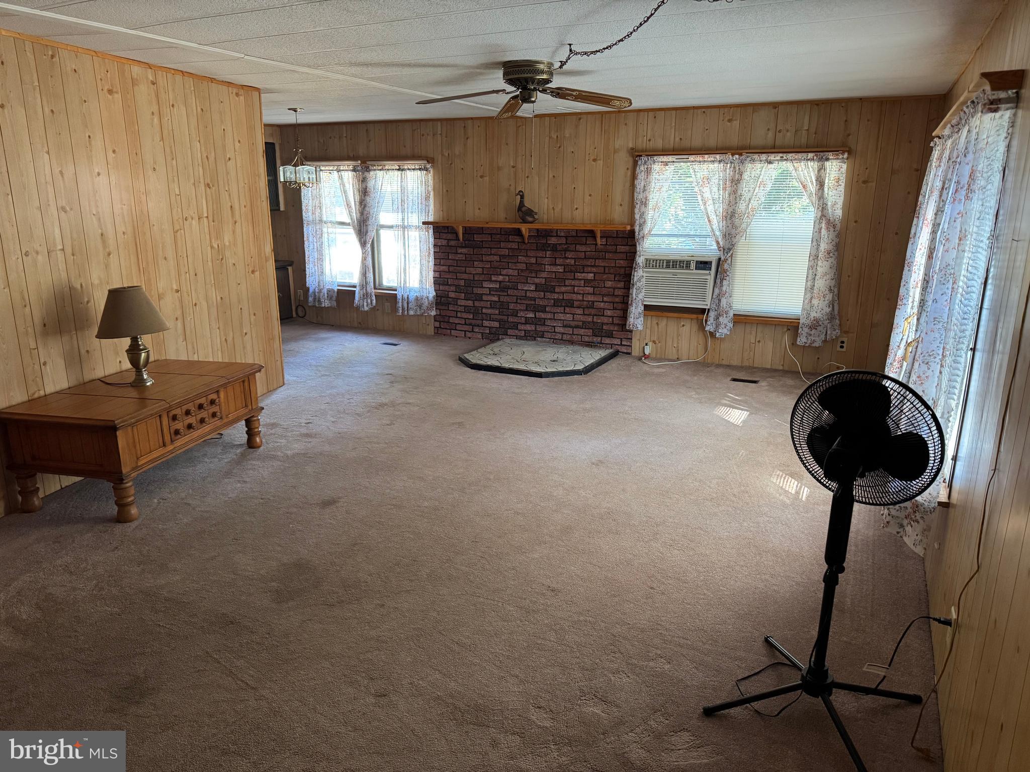 127 Wood Duck Lane Chestertown, MD 21620 - Photo 14 of 26 a living room with furniture and a large window