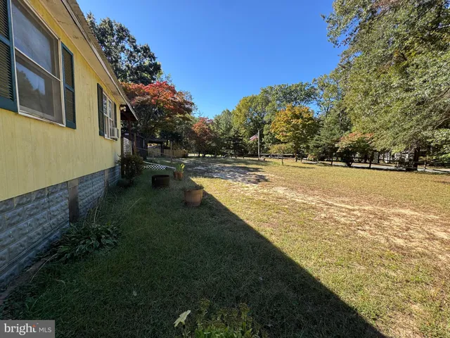 a view of a yard with an outdoor space