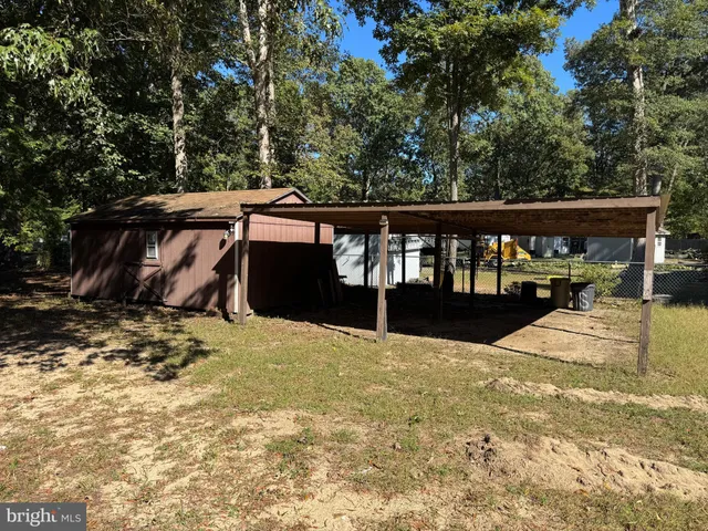 a view of balcony with wooden floor