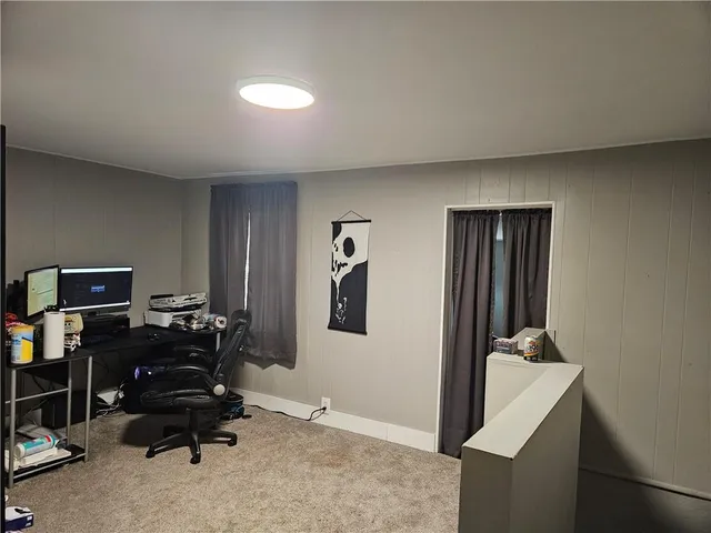 a workspace with furniture and closet