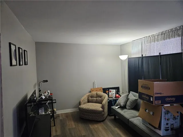 a living room with furniture and a gate