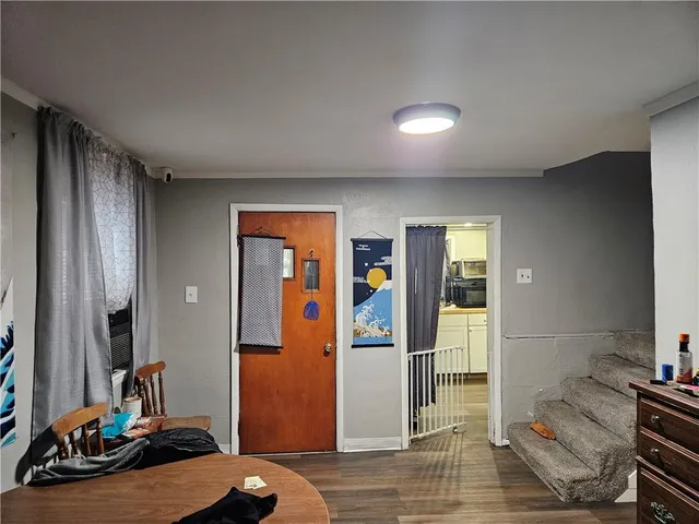 a room with furniture and a mirror